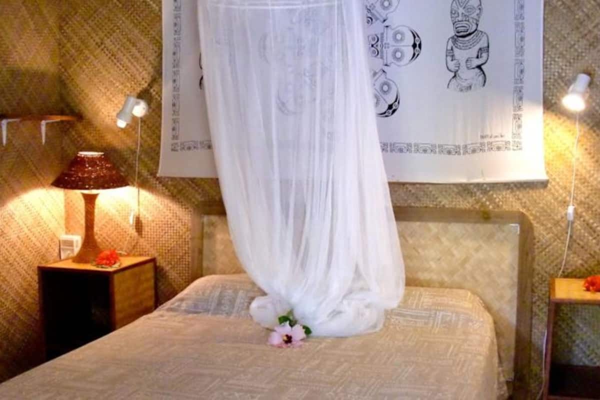 standard bungalow, 1 double bed, garden view | in-room safe, individually decorated, blackout curtains