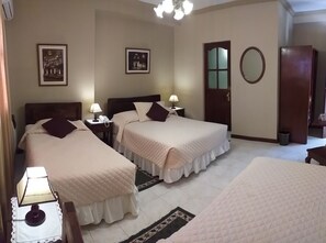 Superior Triple Room | Laptop workspace, blackout curtains, WiFi, bed sheets - Hotel Carmen (Tarija)