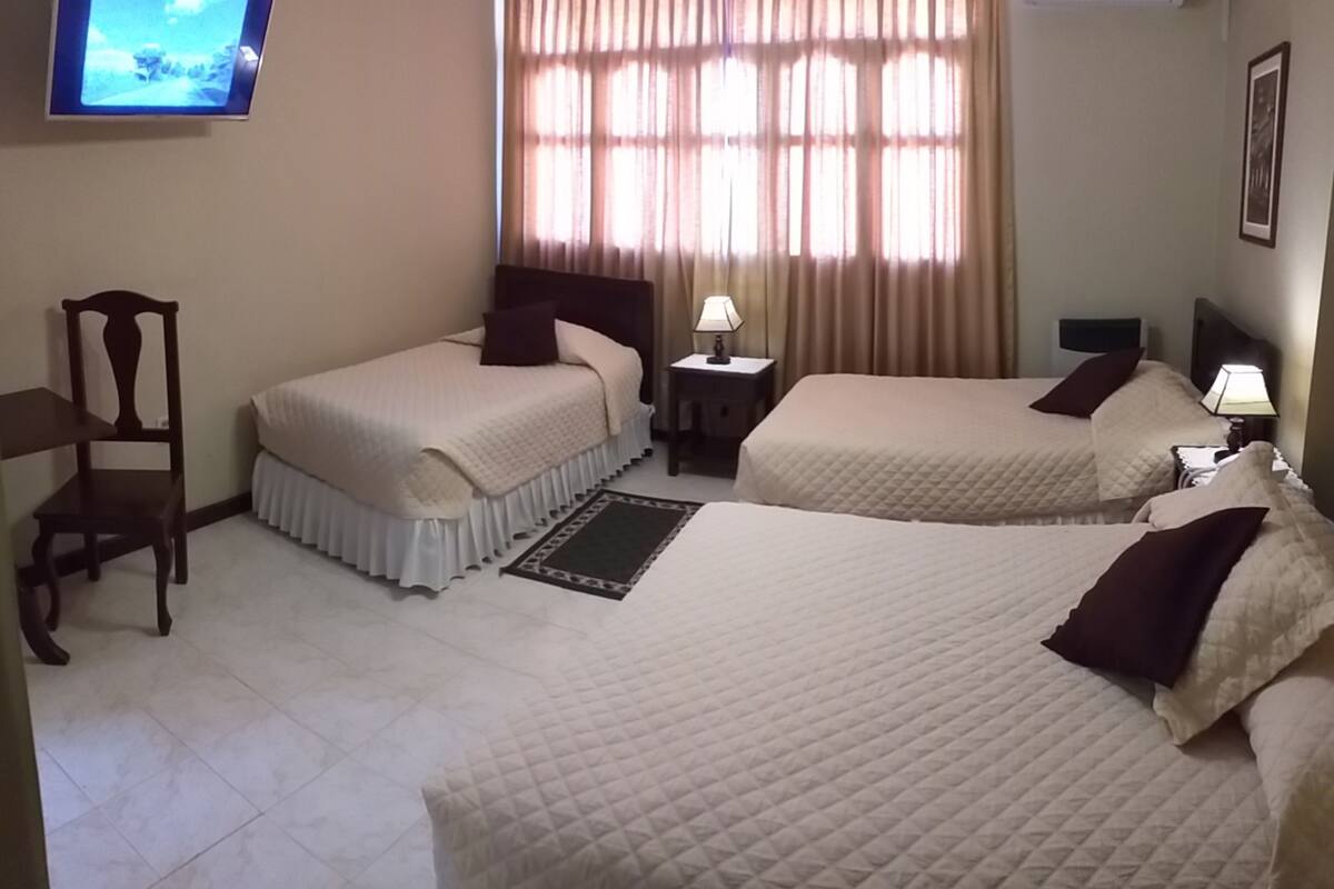 superior triple room | laptop workspace, blackout curtains, wifi, bed sheets