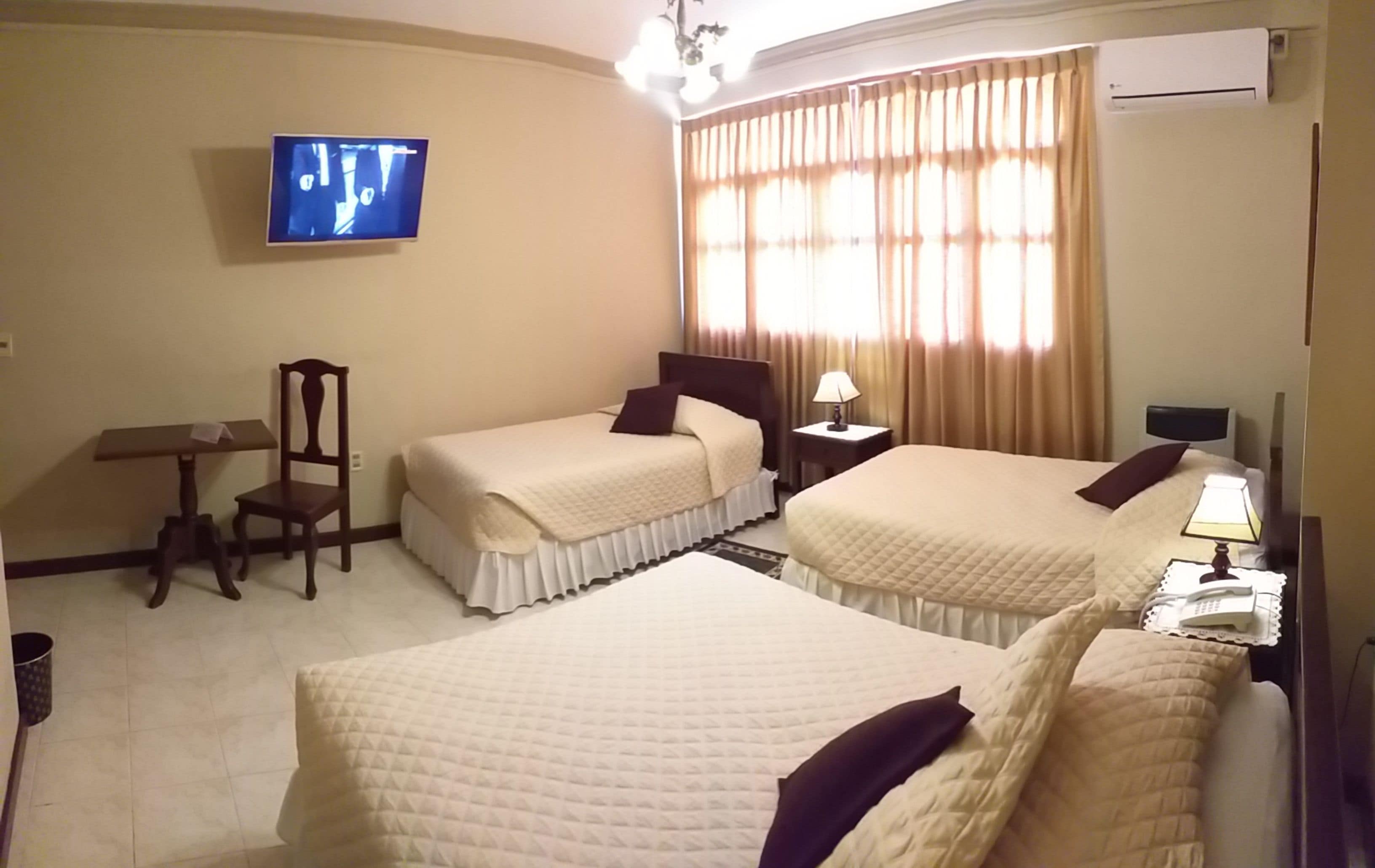 superior triple room | laptop workspace, blackout curtains, wifi, bed sheets