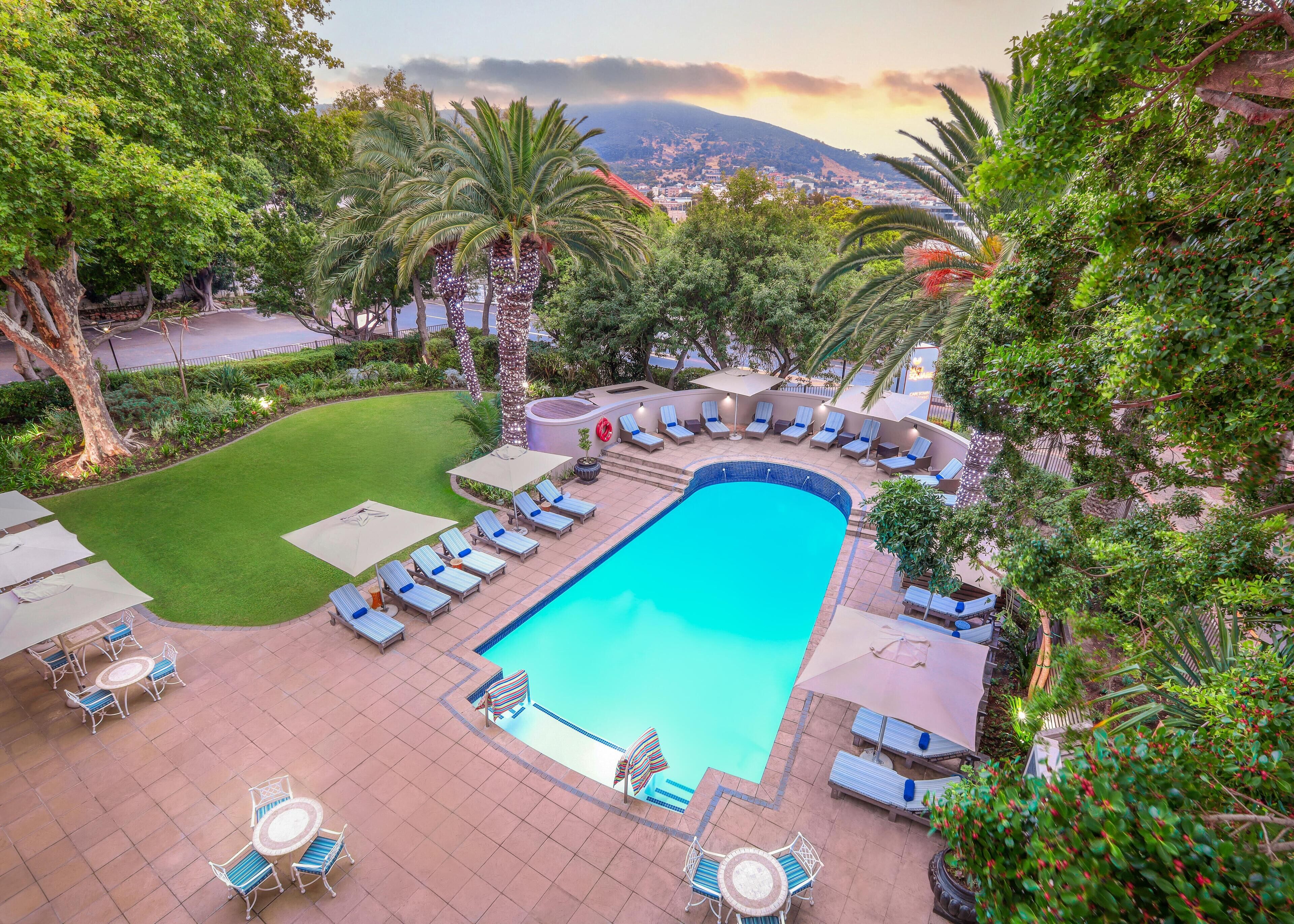 Outdoor pool, pool umbrellas, sun loungers