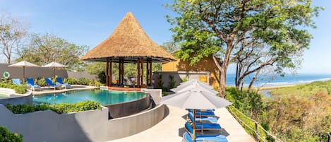 2 outdoor pools, open 9:00 AM to 8:00 PM, pool umbrellas, pool loungers