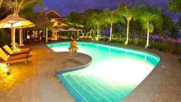 Outdoor pool, free pool cabanas, pool umbrellas