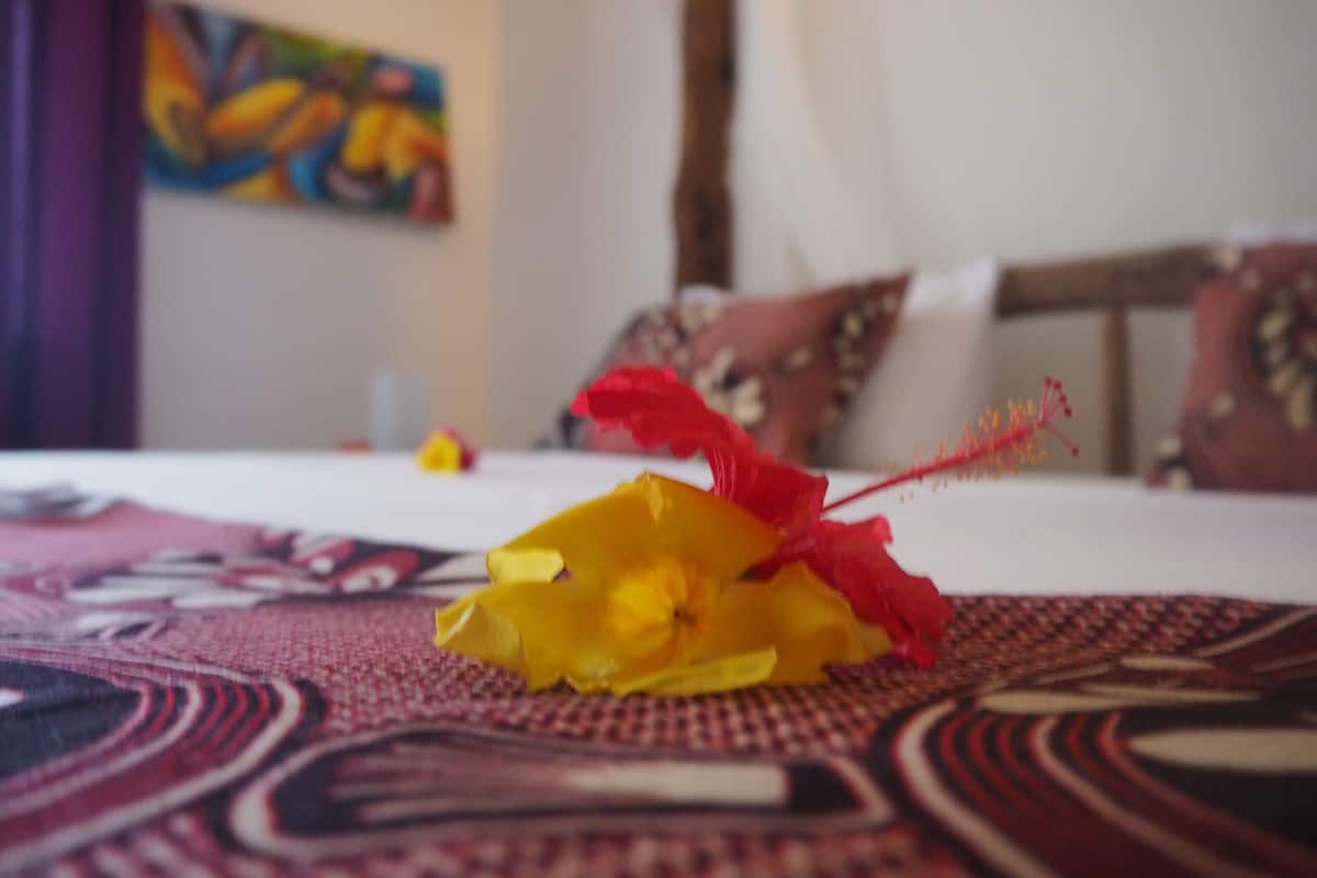 Deluxe Room, Multiple Beds, Partial Ocean View, Ground Floor | 1 bedroom
