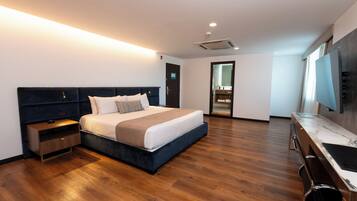 Suite studio exécutive, 1 très grand lit | 1 chambre, literie de qualité, coffre-fort pour ordinateur portable