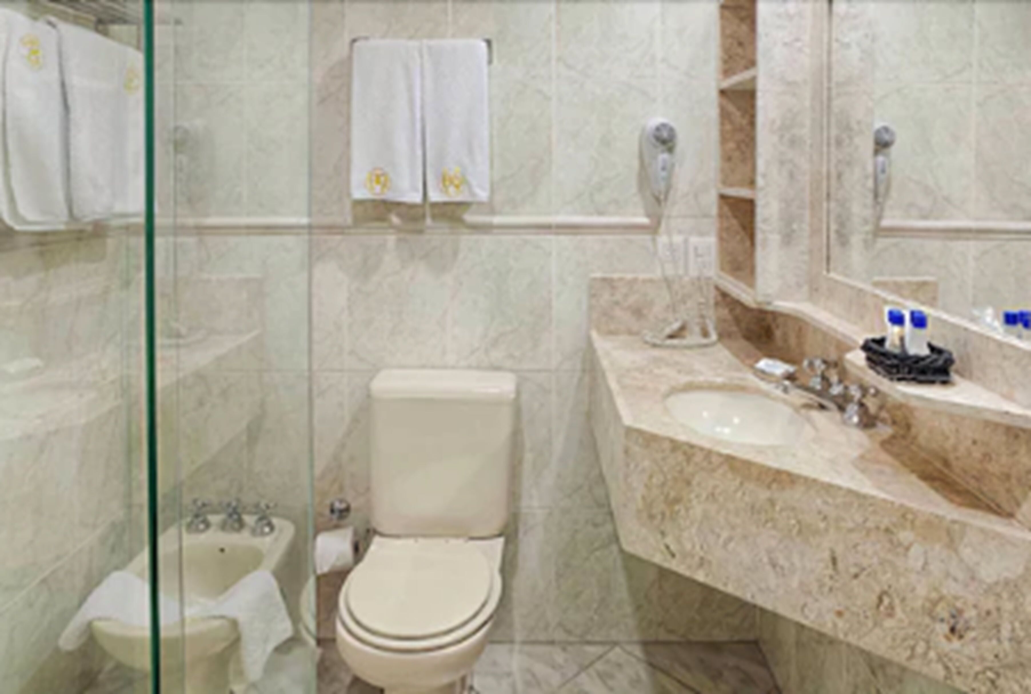 shower, free toiletries, hair dryer, towels