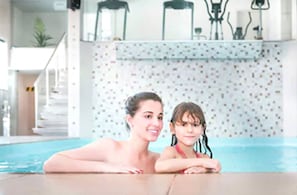 Indoor pool, outdoor pool, pool umbrellas, pool loungers