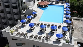 Indoor pool, outdoor pool, pool umbrellas, pool loungers