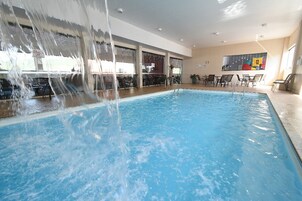 Indoor pool, outdoor pool, pool umbrellas, sun loungers