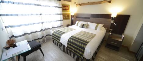 Habitació júnior | Minibar, caixa forta a l'habitació i wifi gratuïta