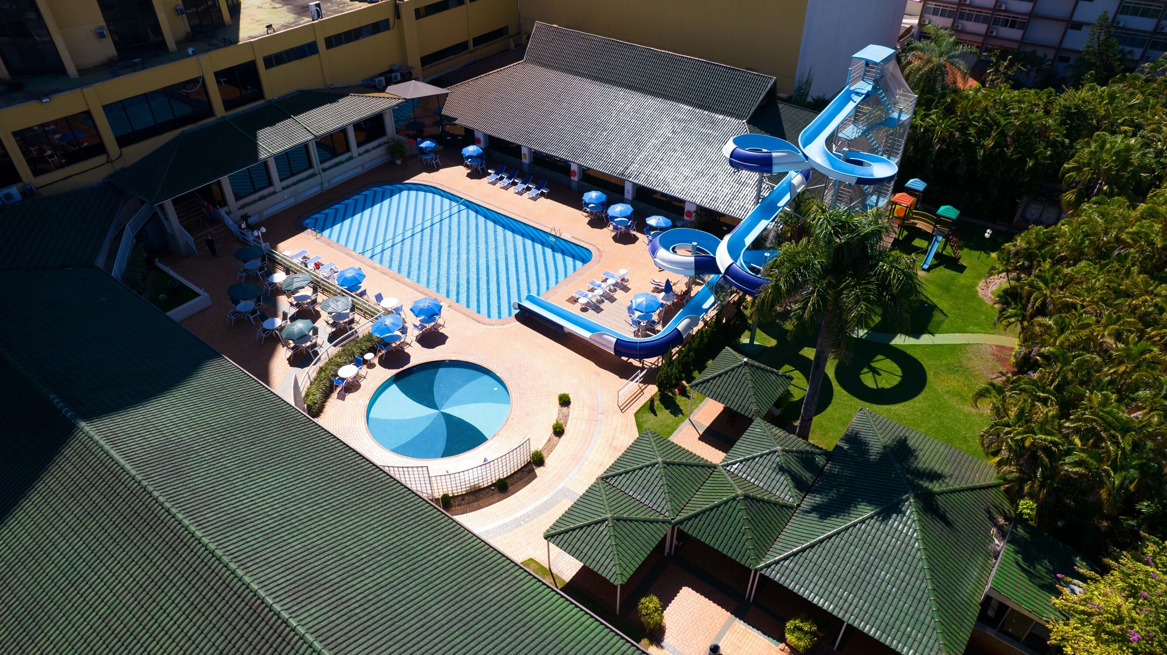 Indoor pool, outdoor pool, open 10:00 AM to 10:00 PM, pool umbrellas