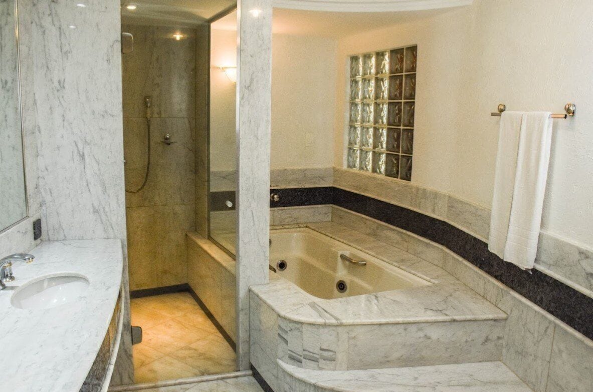 presidential suite | bathroom | shower, free toiletries, hair dryer, towels