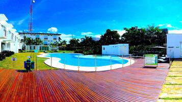 Outdoor pool, open 9 AM to 9 PM, pool loungers