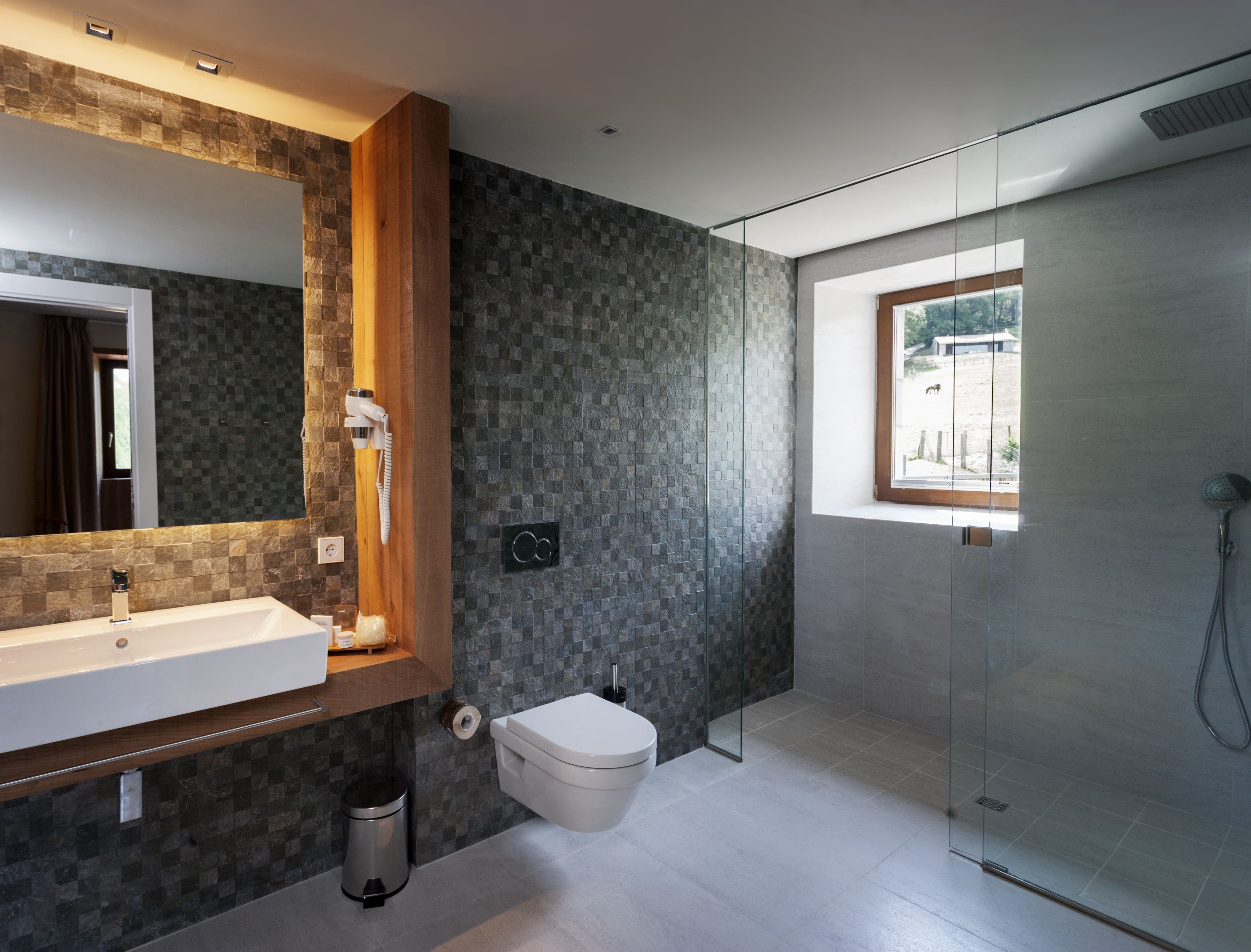 shower, rainfall showerhead, hair dryer, towels