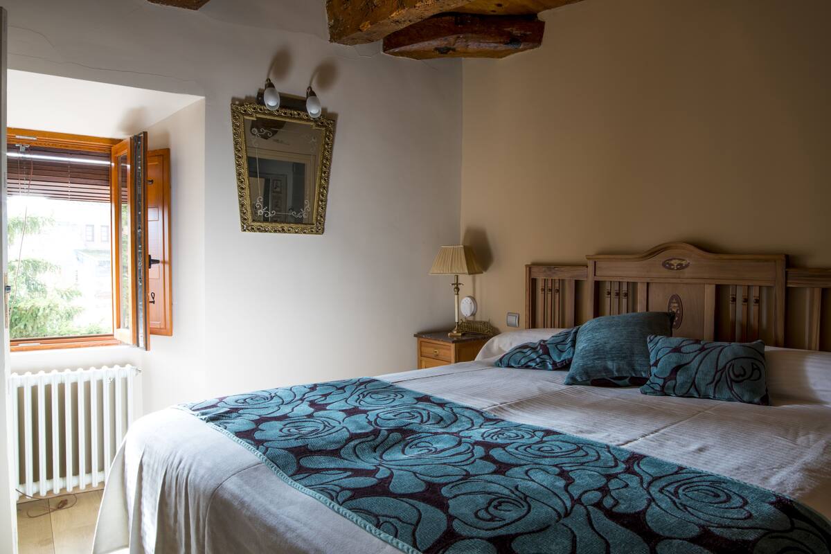 Desk, blackout drapes, iron/ironing board, rollaway beds