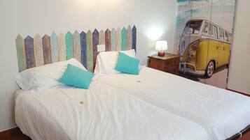 Desk, blackout curtains, free cots/infant beds, rollaway beds