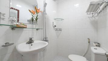 Shower, free toiletries, slippers, towels