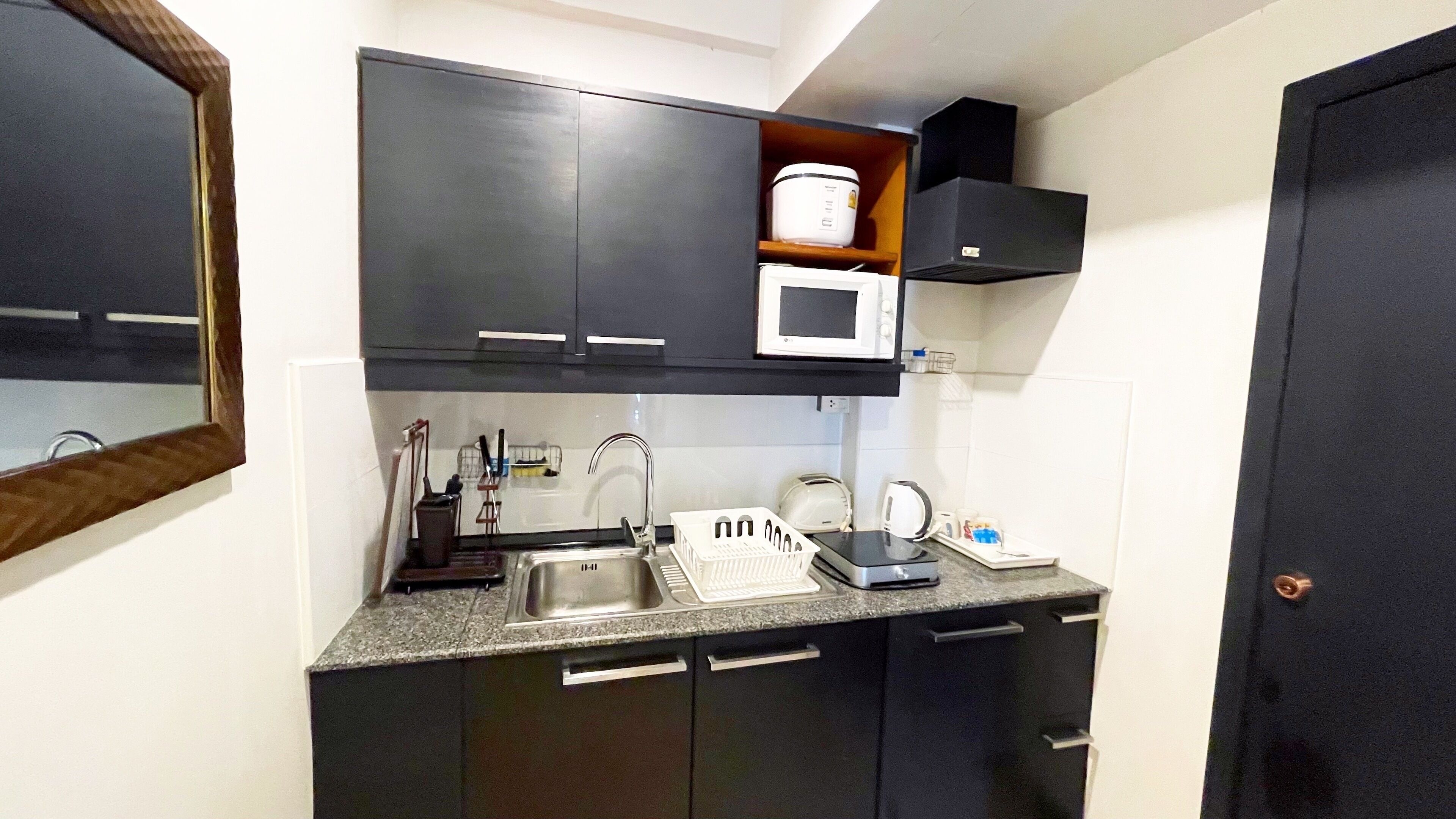 2 bedroom seaview suite with kitchen | private kitchen | full-sized fridge, electric kettle, cleaning supplies