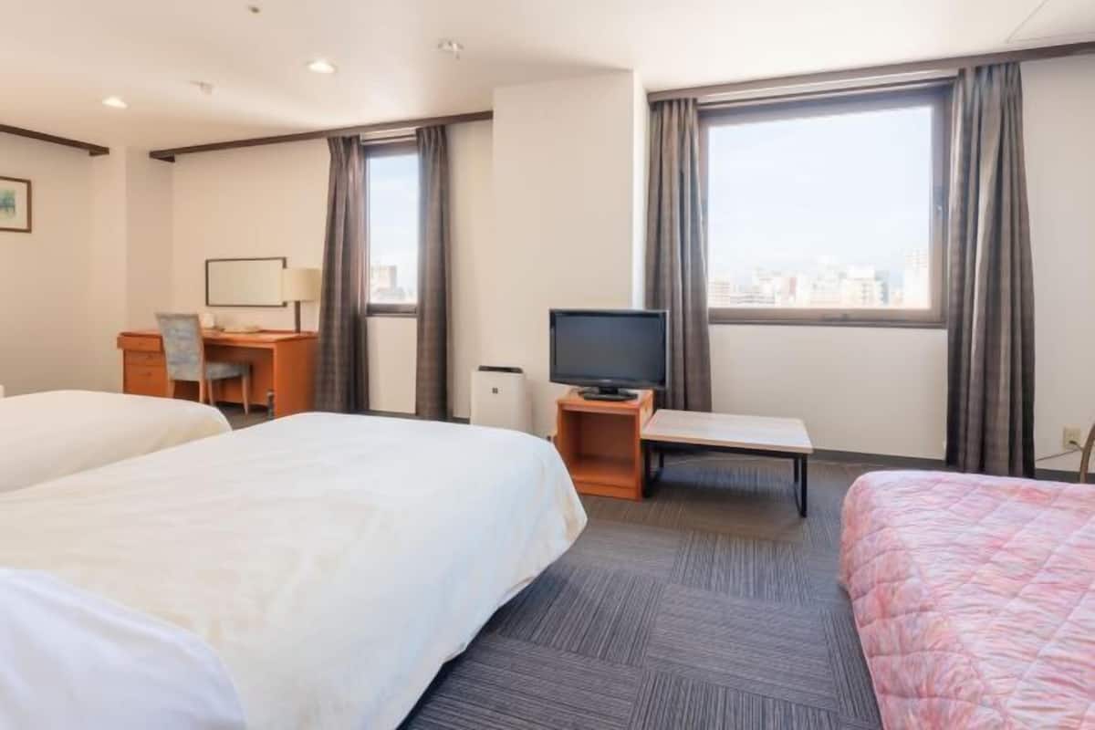 Desk, iron/ironing board, free WiFi, bed sheets