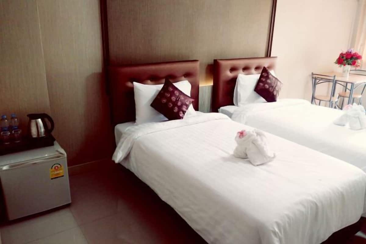1 dormitorio y minibar (con algunos artículos gratuitos)