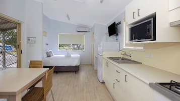 Standard Cabin - Sleeps 4 | Living area | TV