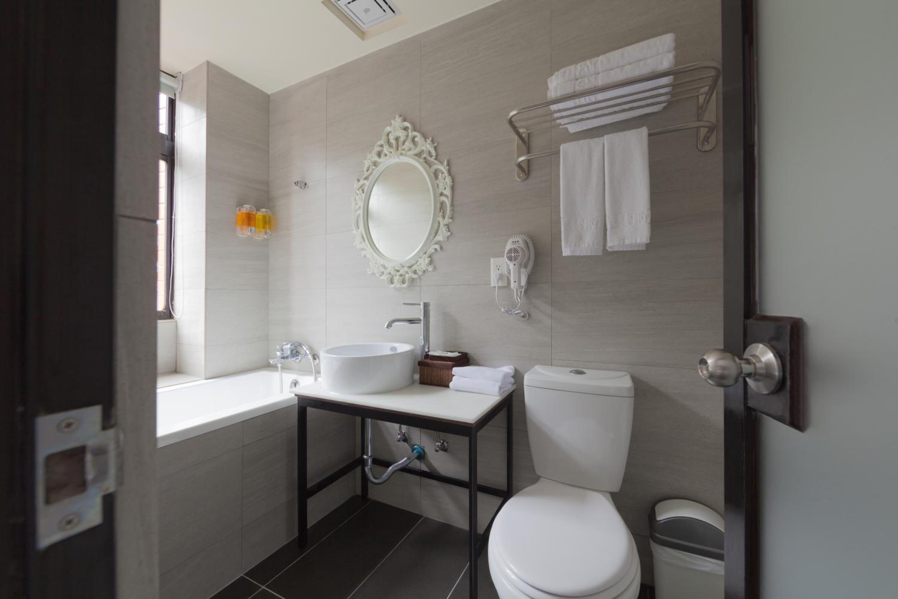Shower, free toiletries, hair dryer, slippers