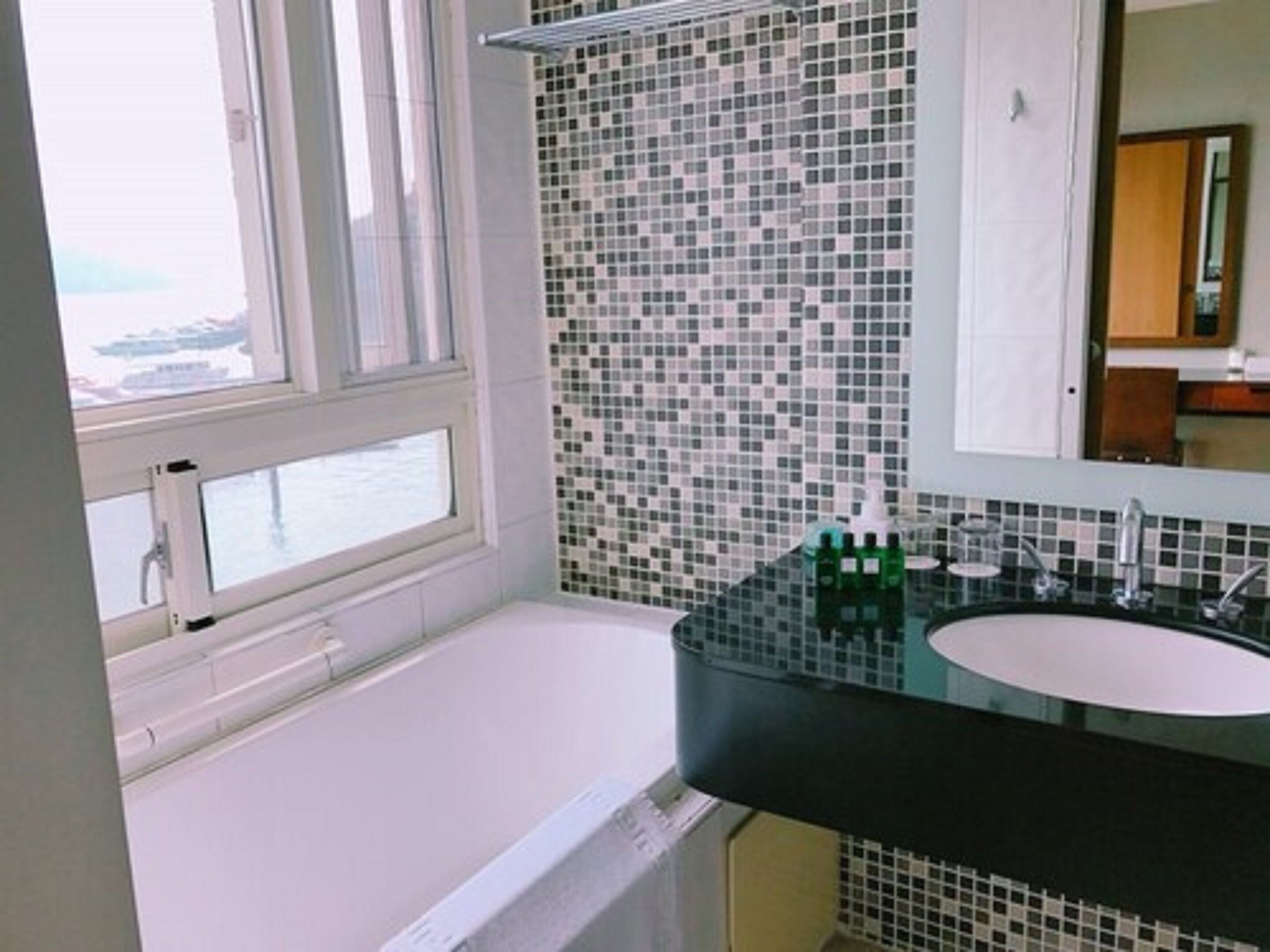 classic double room, lake view front seat | bathroom | separate bathtub and shower, deep-soaking bathtub, designer toiletries