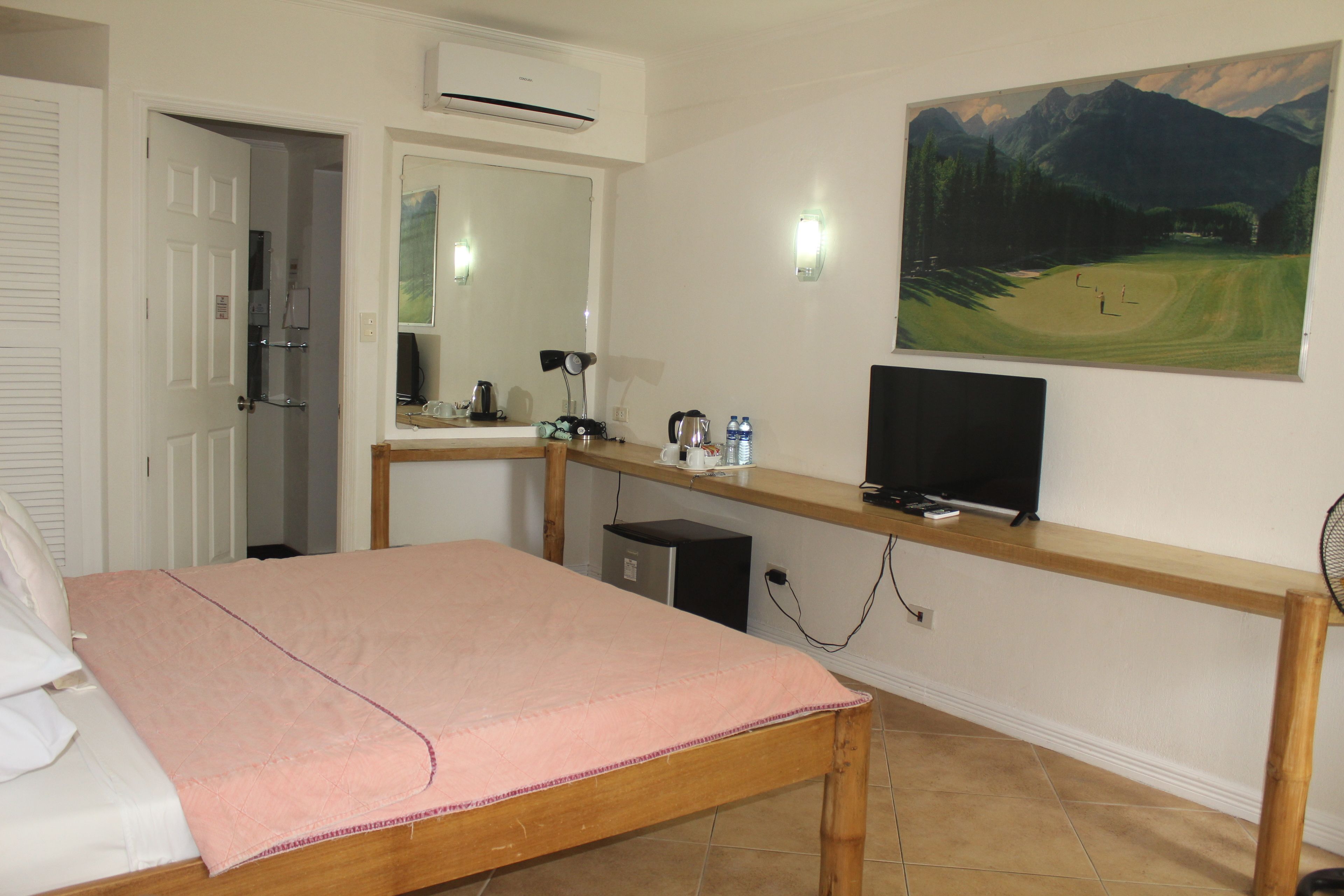 premier | living room | 32-inch flat-screen tv with cable channels, tv