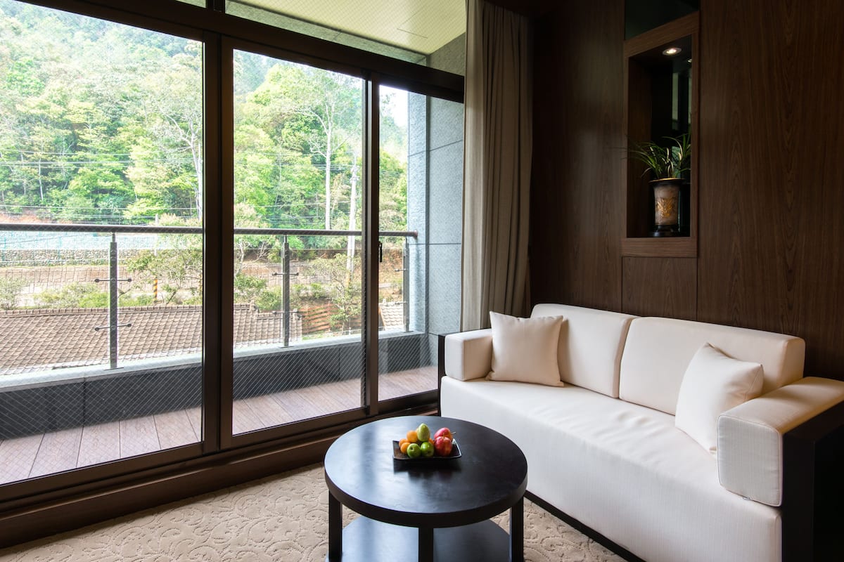 family quadruple room, 2 queen beds | living area | 42-inch led tv with digital channels, tv, table football