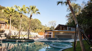 Outdoor pool, pool umbrellas, sun loungers