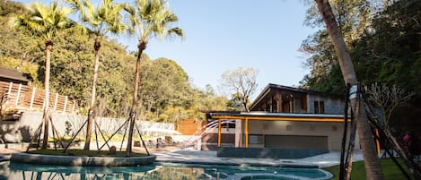 Outdoor pool, pool umbrellas, sun loungers