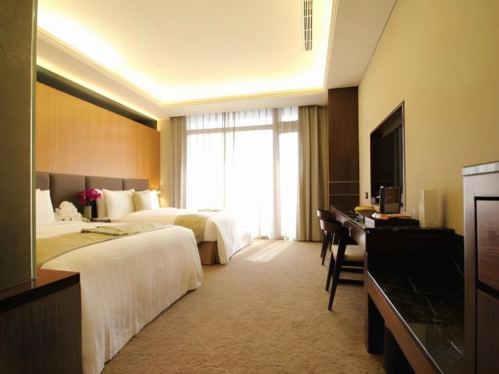 เครื่องนอนระดับพรีเมียม, เตียงพร้อมฟูกเสริมที่นอน, มินิบาร์