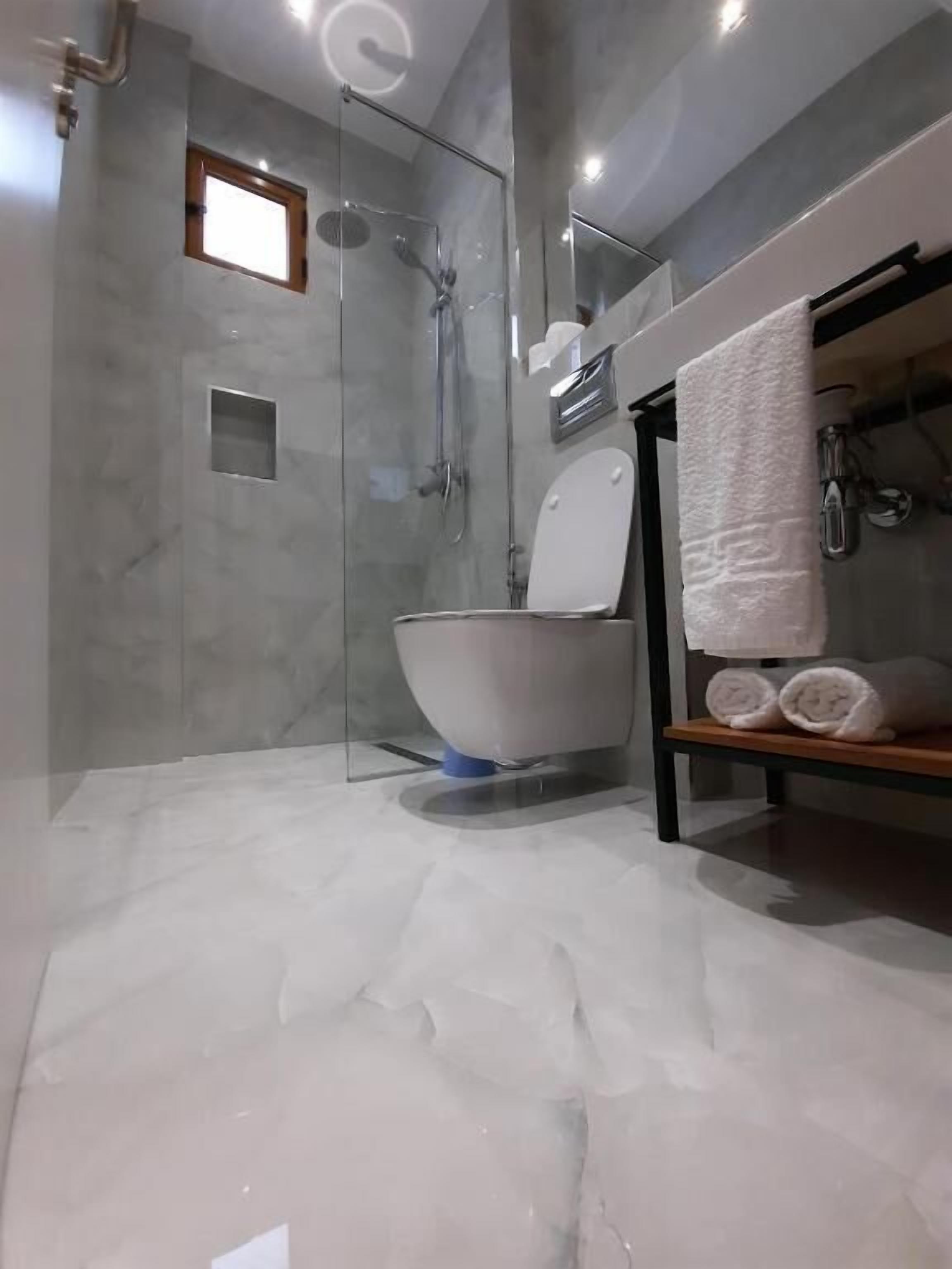 superior triple room, balcony | bathroom | shower, free toiletries, hair dryer, bathrobes