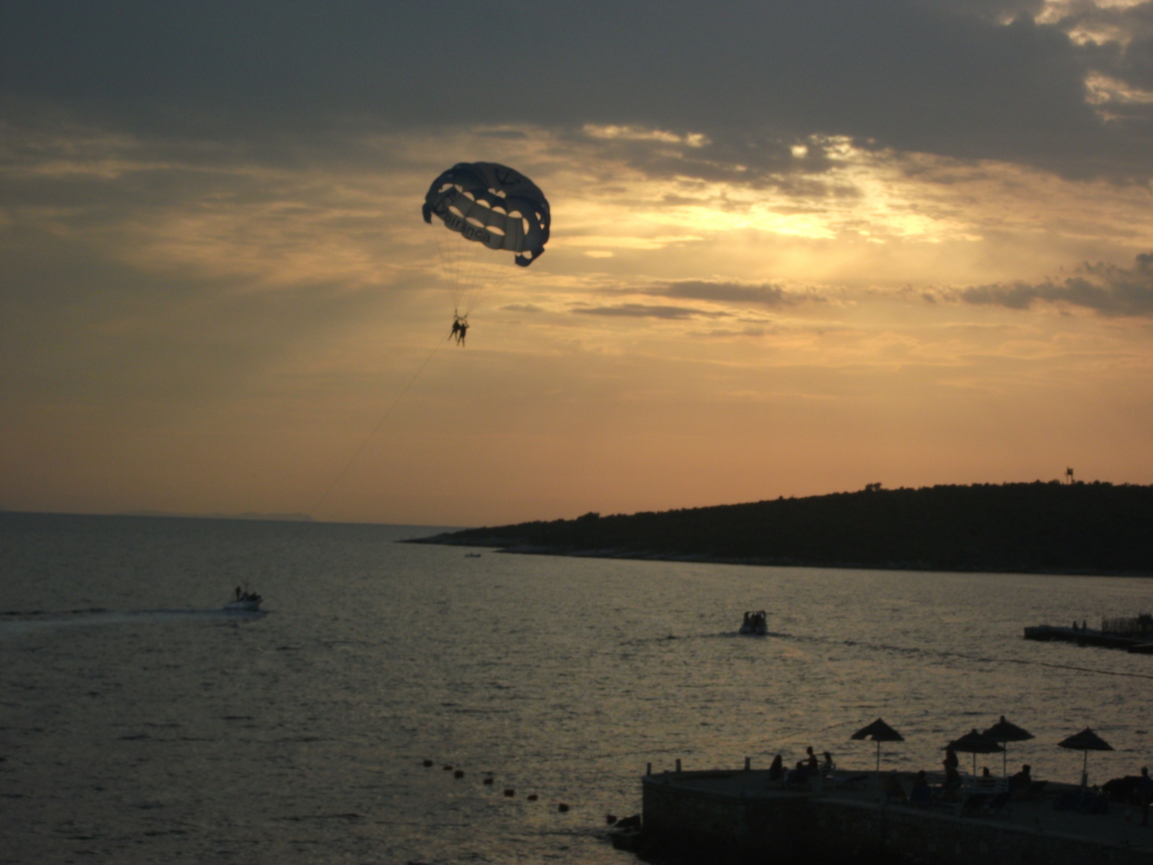on the beach, sun-loungers, beach umbrellas, beach towels