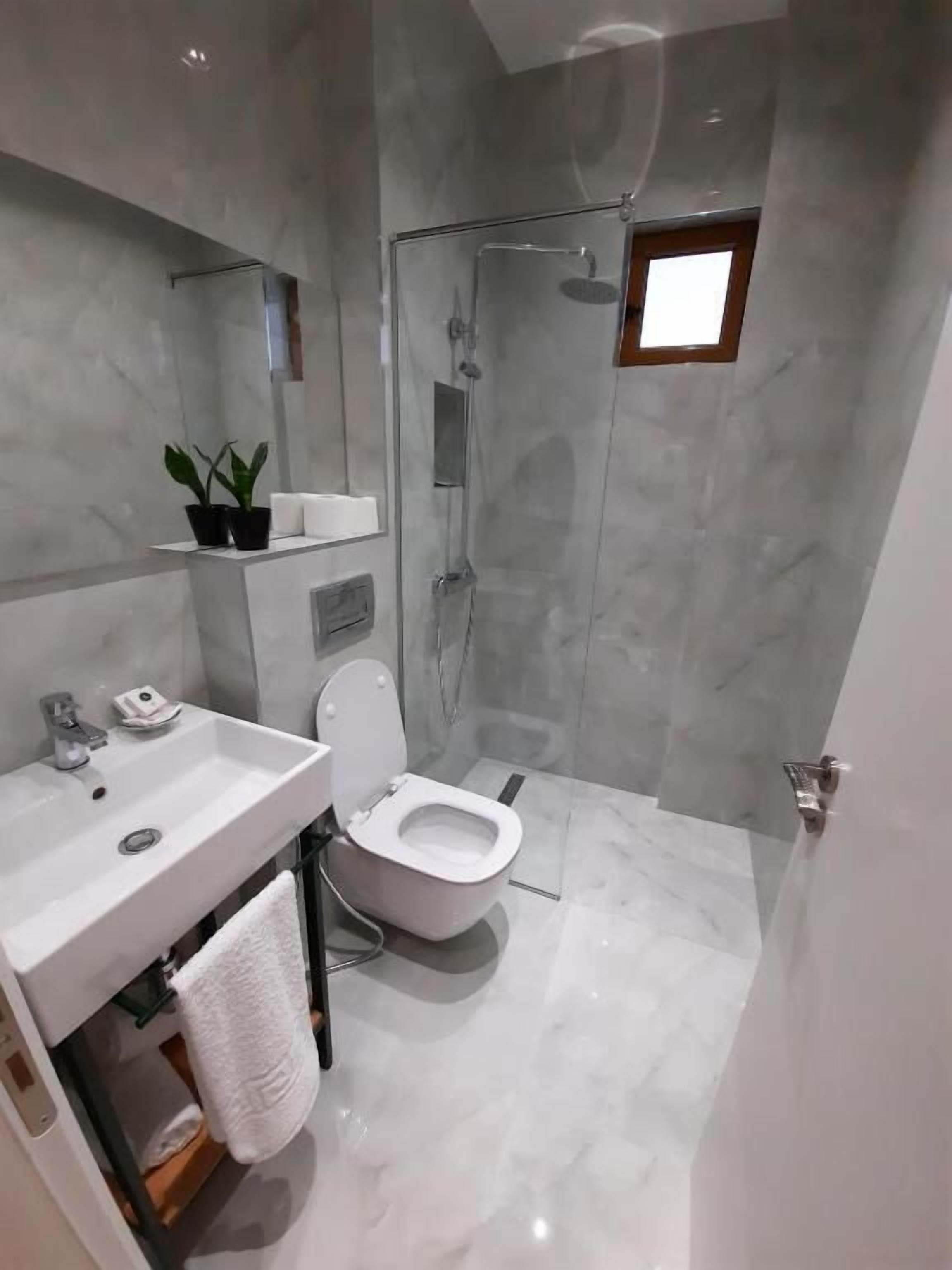 superior triple room, balcony | bathroom | shower, free toiletries, hair dryer, bathrobes