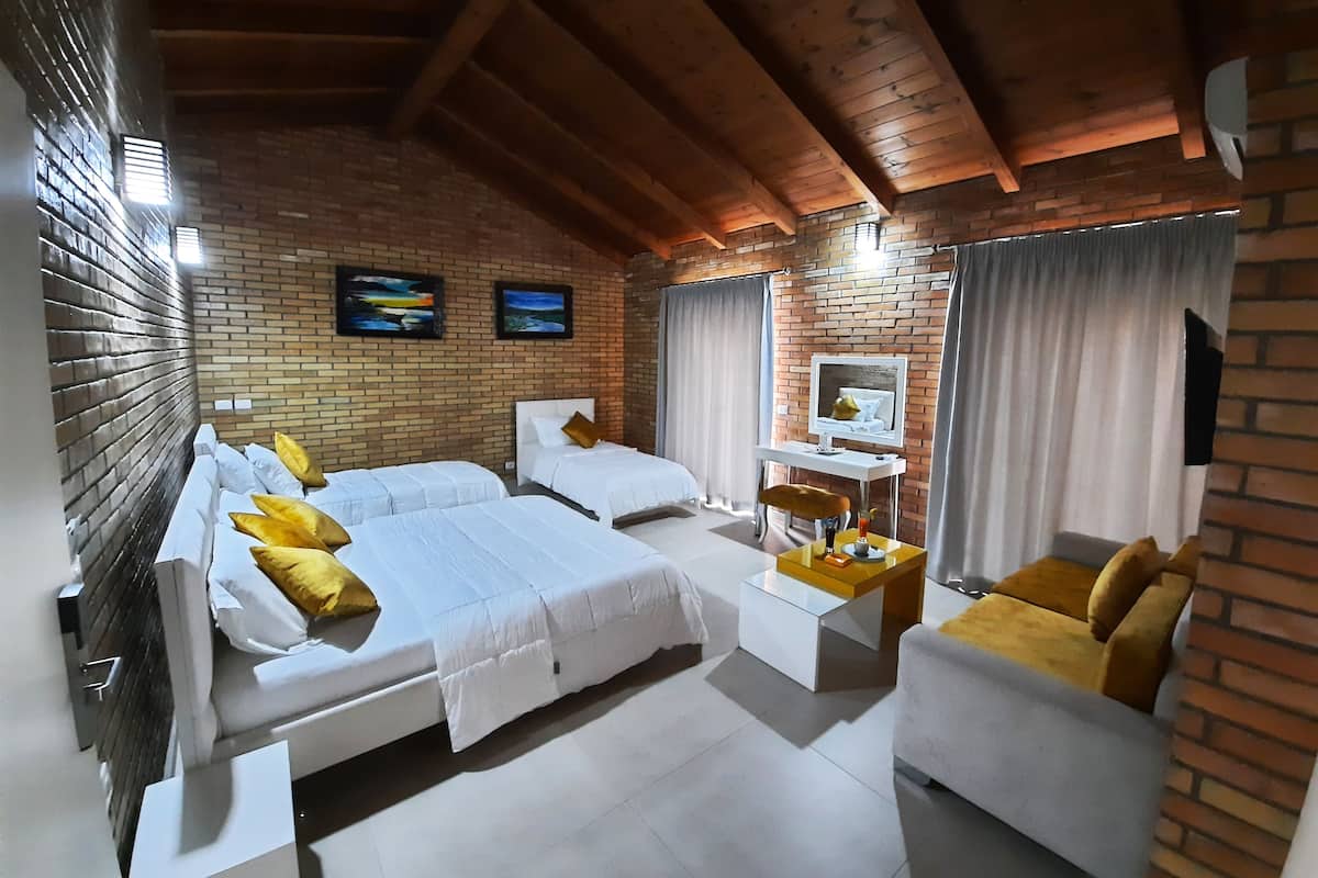 Deluxe Suite, Balcony | 1 bedroom, desk, free WiFi