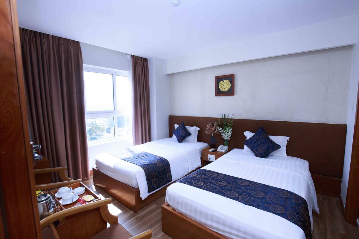 Deluxe City View Double/Twin (no balcony) | Minibar, in-room safe, desk, blackout drapes