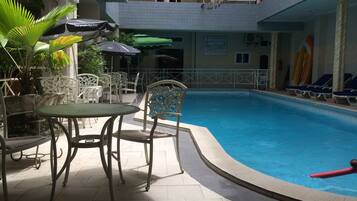 Outdoor pool, pool umbrellas, pool loungers