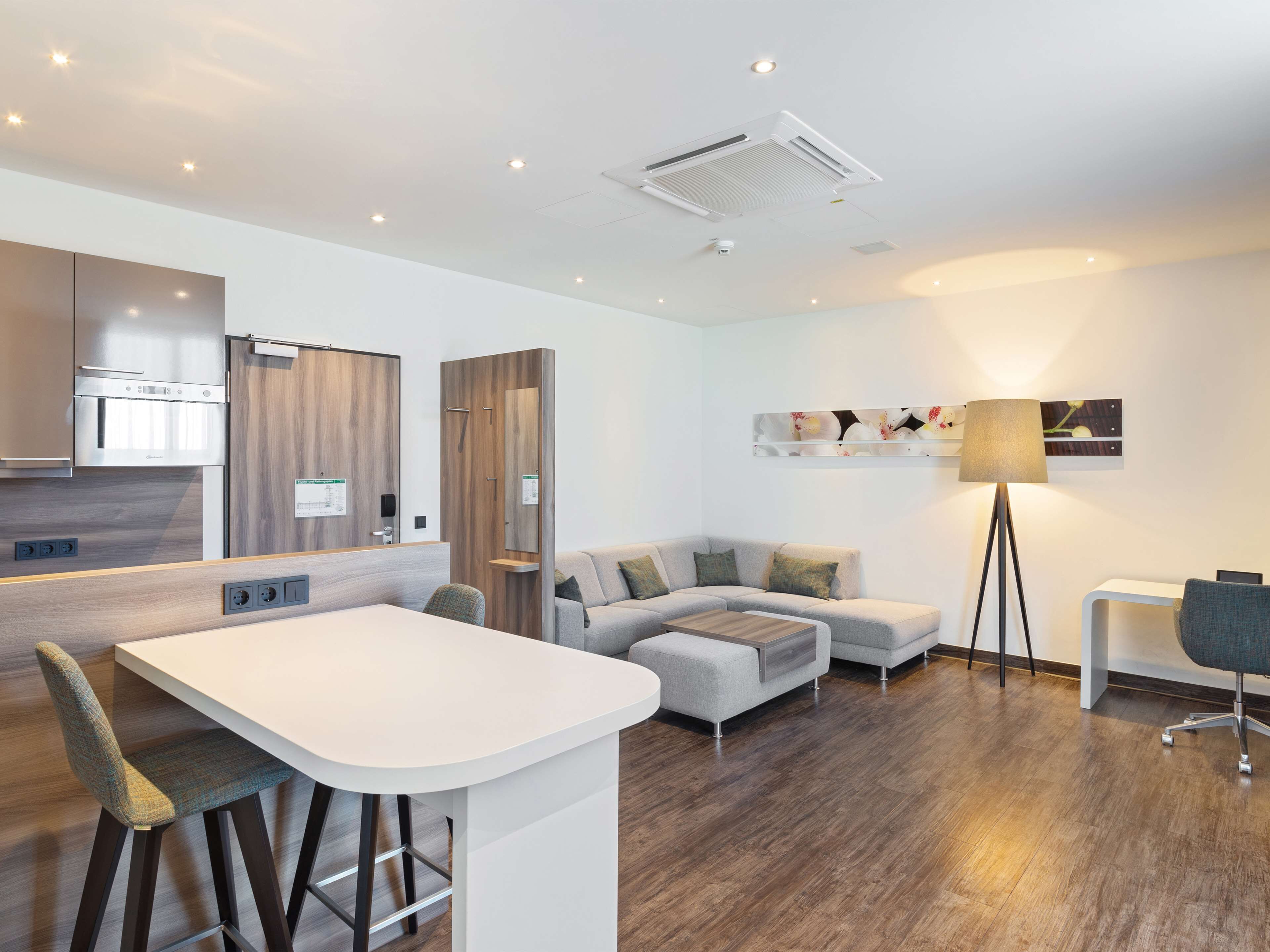 premium bedding, pillow-top beds, desk, laptop workspace