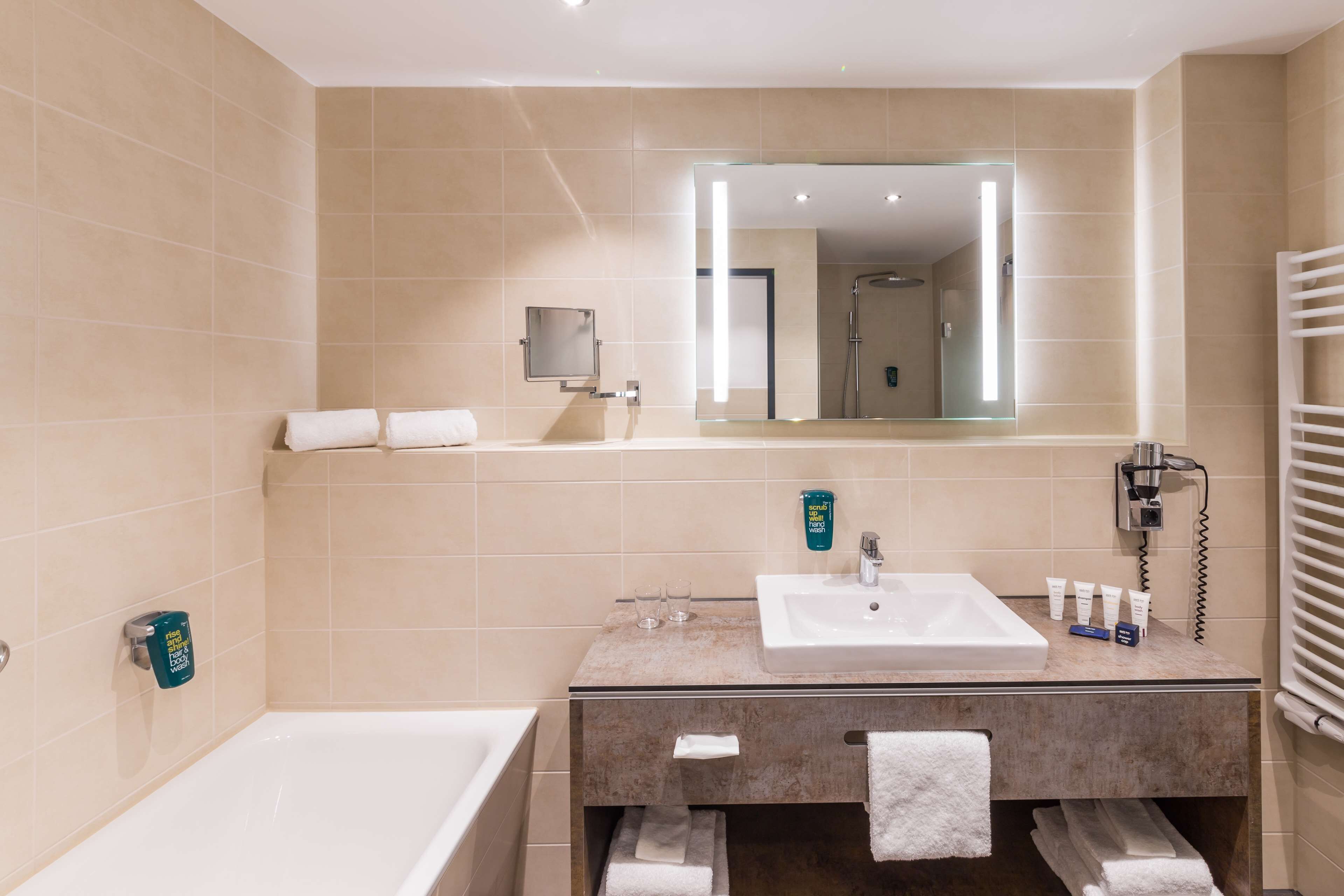 hair dryer, towels, soap, shampoo