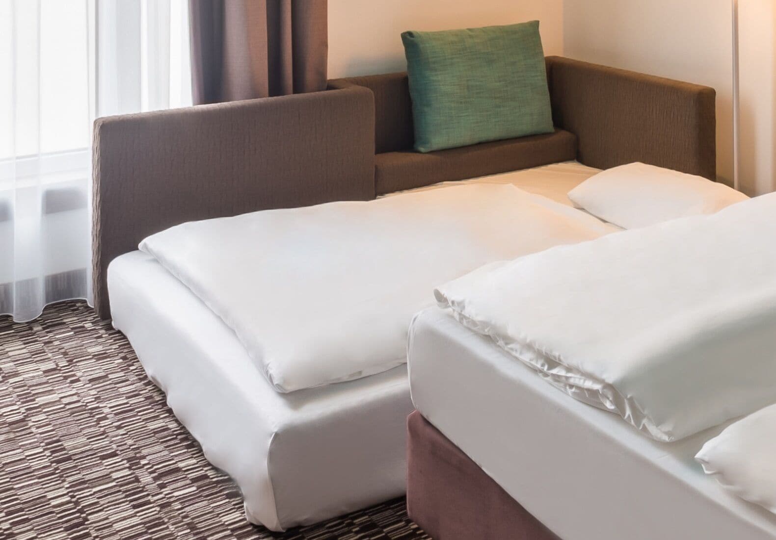 family room | premium bedding, pillow-top beds, desk, laptop workspace