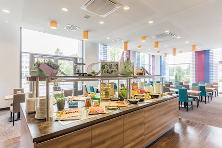 Daily buffet breakfast (EUR 23 per person)