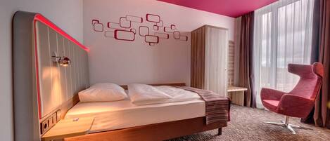 Premium bedding, pillowtop beds, desk, laptop workspace