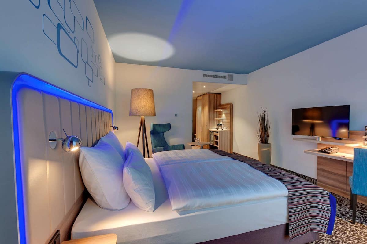 Premium bedding, pillow-top beds, desk, laptop workspace