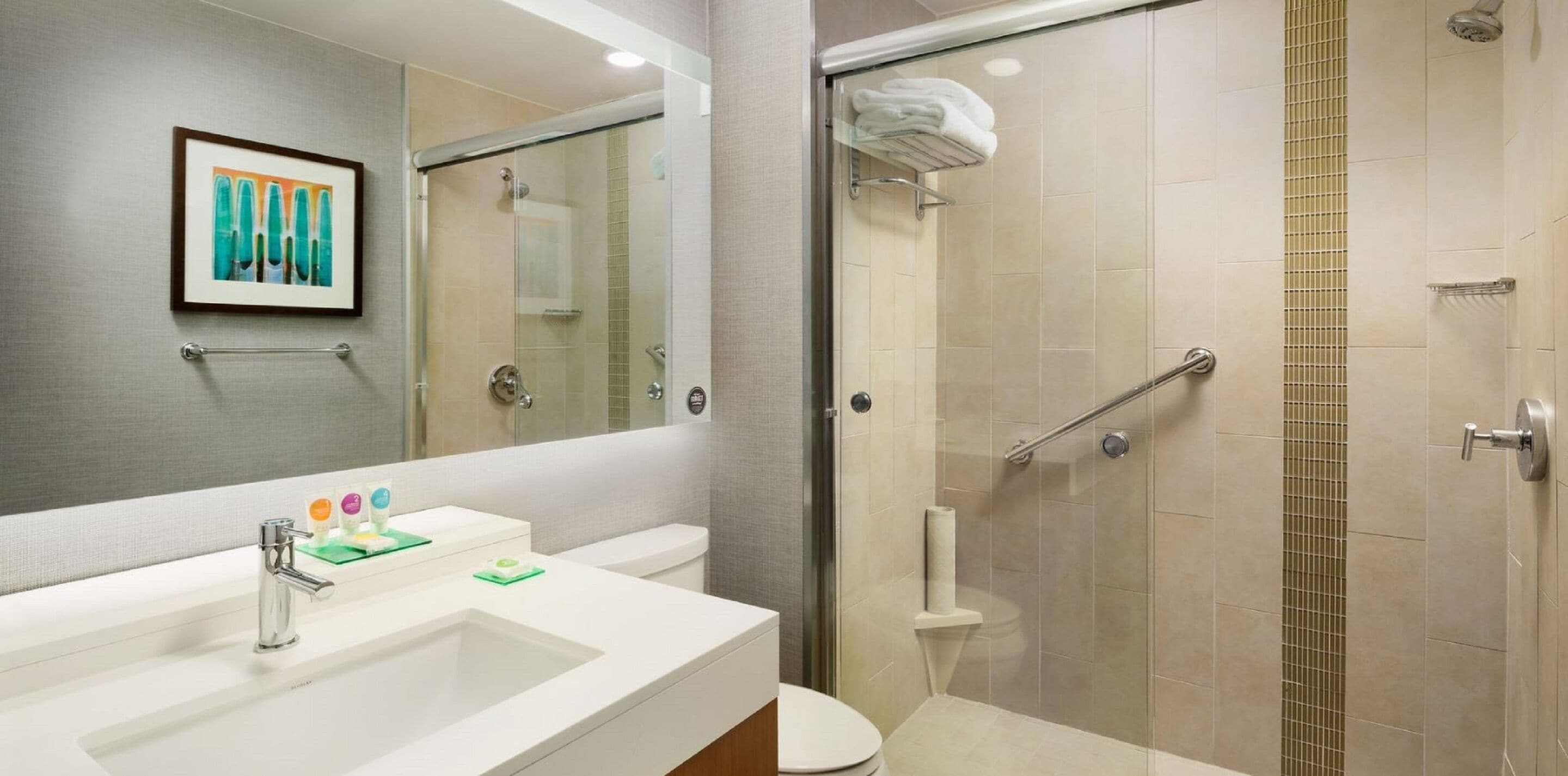 king suite - 2 room suite | bathroom | shower, designer toiletries, hair dryer, towels