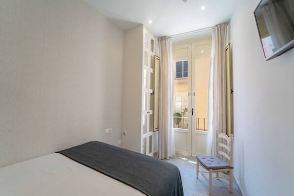 Junior-sviitti, parveke (I) | Pimennysverhot, ilmainen Wi-Fi, vuodevaatteet