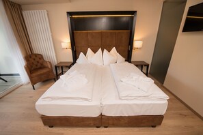 Premium bedding, in-room safe, desk, soundproofing