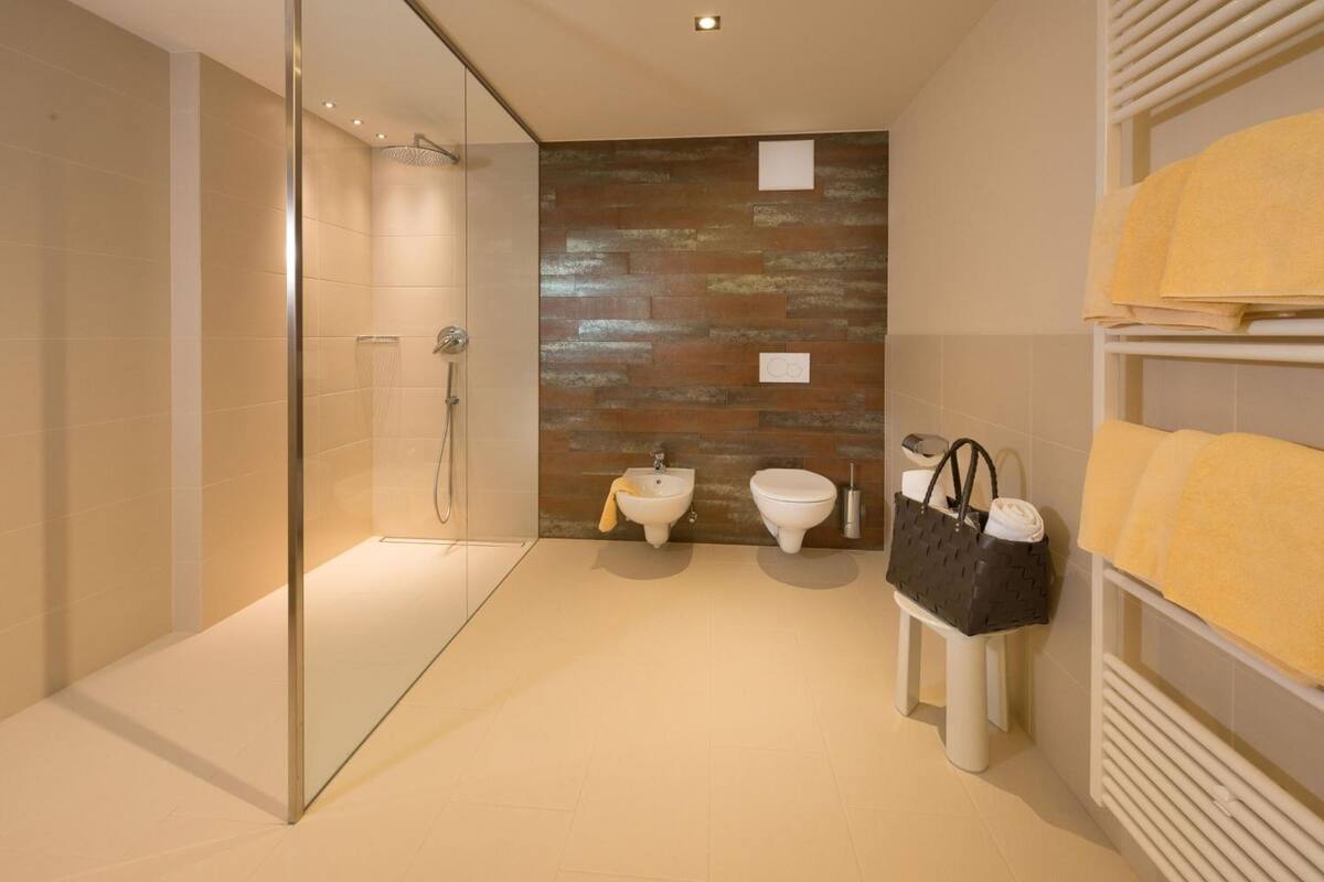 shower, free toiletries, hair dryer, bathrobes