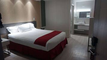 Desk, laptop workspace, iron/ironing board, cribs/infant beds