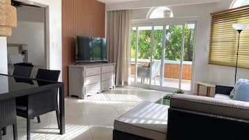 Standard Apartment, 2 Bedrooms, Garden View | Living area | Flat-screen TV